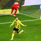 Guerreiro keeps Dortmund in Champions League hunt