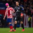 Atletico Madrid's Griezmann and Oblak dejected after the defeat to Barcelona.
