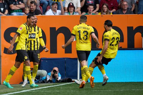 Borussia Dortmund one win away from Bundesliga title after swatting ten-man Ausburg