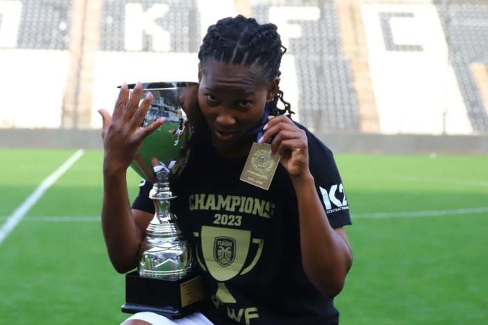 Harambee Starlets Esse Akida celebrates PAOK league title.