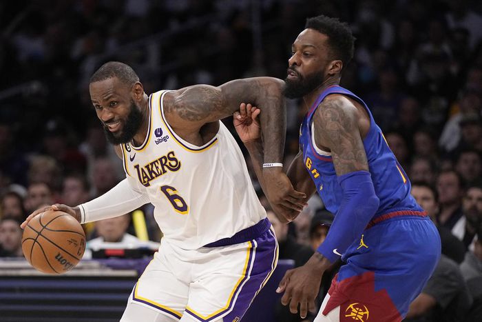 LeBron James in action for the Lakers against the Denver  Nuggets