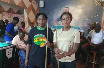 Sheilla Ankah prepares her cue to face Rasheeda Mutesi in Nile Special Pool Open