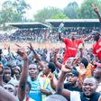 Shabana supporters celebrate with players after securing top flight promotion.