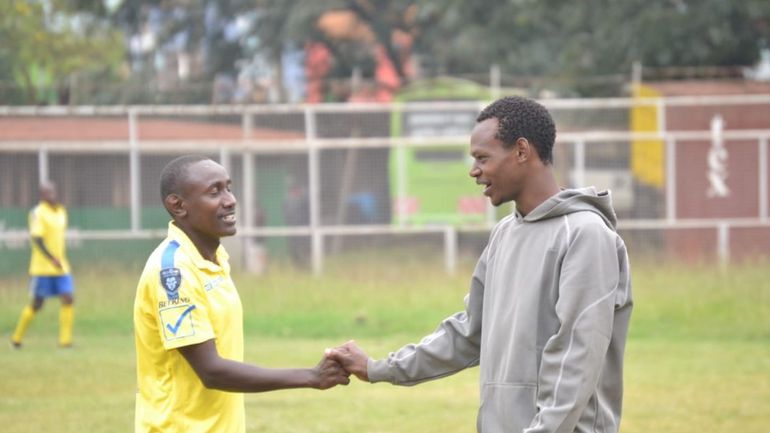 Bidco United striker Stephen Waruru and his coach Anthony Akhulia.