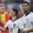Jordan Pickford with his England teammates Phil Foden and Jude Bellingham.