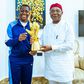 Super Falcons goalkeeper Chiamaka Nnadozie presents her CAF Award to the Imo State Governor and First Lady.