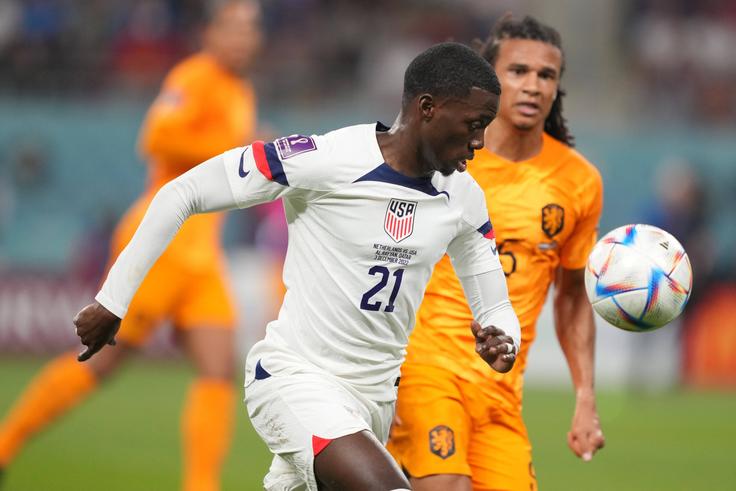 Timothy Weah and Nathan Ake at the 2022 World Cup | Imago