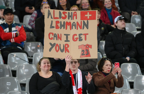 A Switzerland fan asking for Alisha Lehmann jersey