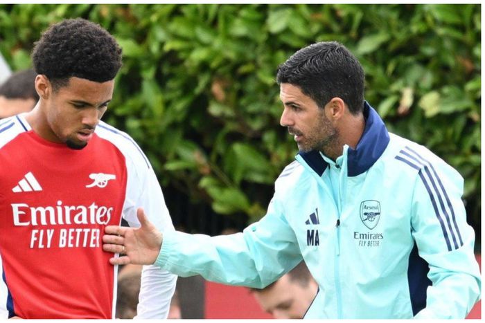 Mikel Arteta and Ethan Nwaneri.