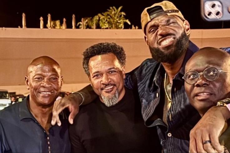 Lagos State Governor Babajide Sanwo-Olu takes out his phone for a selfie with NBA icon LeBron James in Paris.