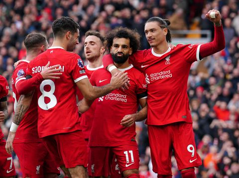 Salah brace sends Liverpool top after bad-tempered Merseyside derby win over Everton