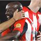 African superstars Mbeumo and Wissa celebrate for the Bees against Leicester.