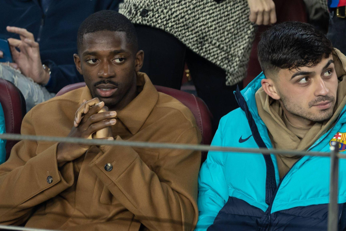 Pedri and Dembele watching from the stands