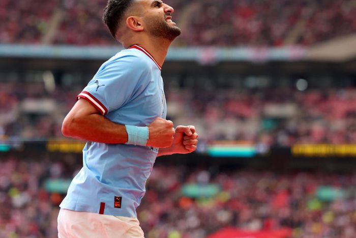 Machester City's Riyad Mahrez celebrates FA Cup semi-final hattrick.