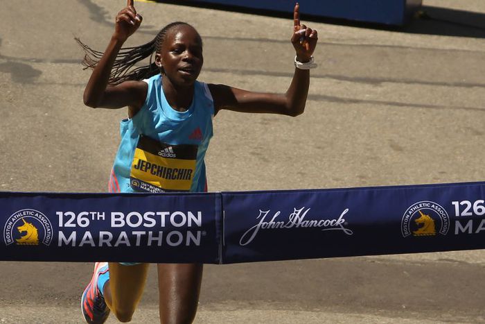 Peres Jepchirchir cuts the tape at the 2022 Boston Marathon