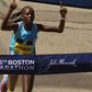 Peres Jepchirchir cuts the tape at the 2022 Boston Marathon