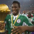 Mikel Obi with the 2013 AFCON title.