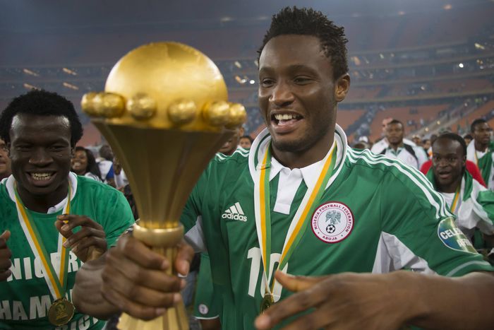 Mikel Obi with the 2013 AFCON title.