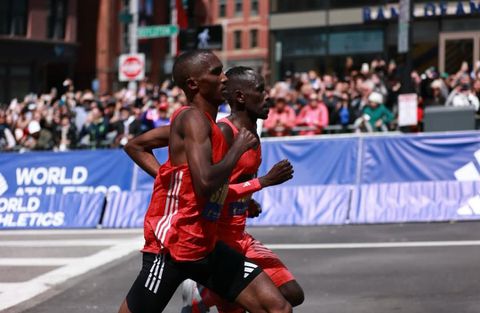 Cybrian Kotut (R) and Alphonce Simbu (L) batlle it out at the 2025 Boston Marathon.