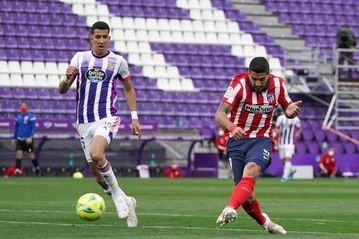 'Man of character' Suarez leads Atletico to La Liga as Real fall short
