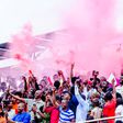 Enugu Rangers fans celebrate their title win.