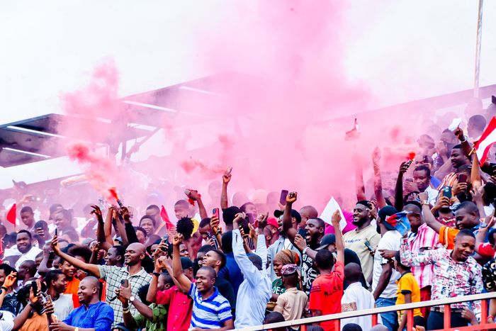 Enugu Rangers fans celebrate their title win.