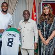 Super Eagles of Nigeria star Frank Onyeka gifts Abia State governor Alex Otti jersey.