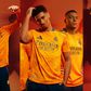 Inspired by Cristiano Ronaldo's La Decima triumph, check out the new 2024/25 Orange Real Madrid jersey modelled by Mbappe and Bellingham