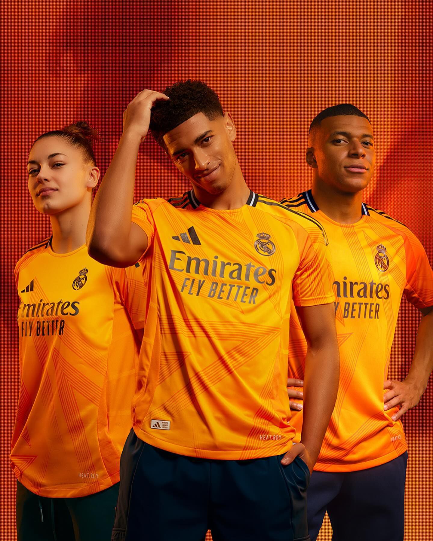 Mbappe and Bellingham model Orange Real Madrid away jersey