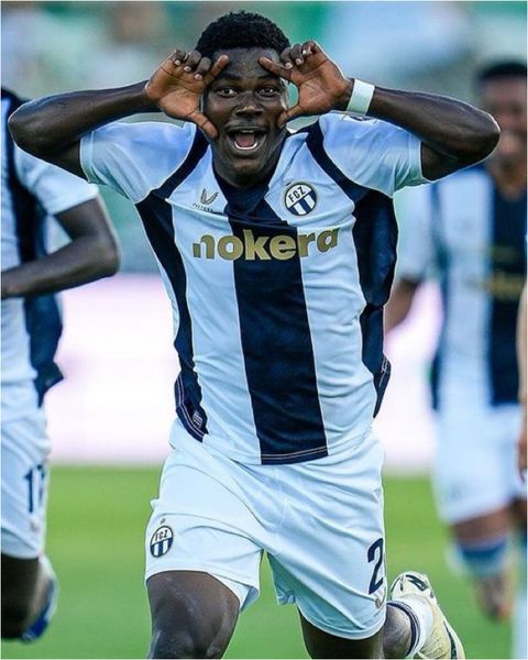 Umeh celebrates his winner for Zurich in the league.