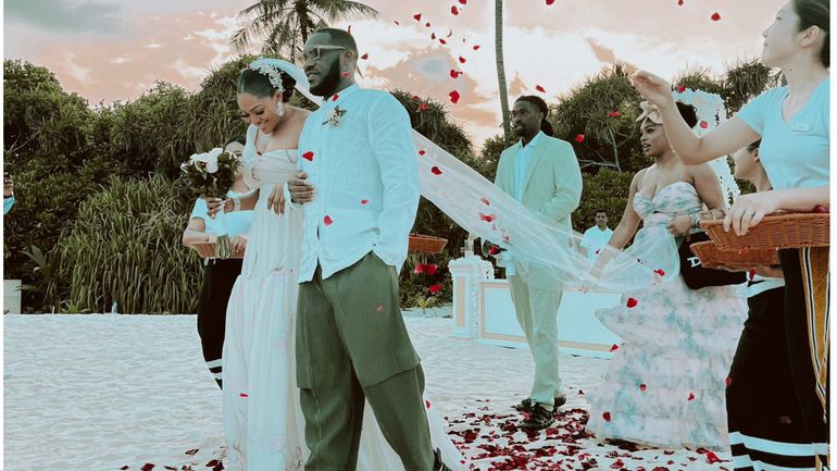 Former Super Eagles of Nigeria captain Jay Jay Okocha and his wife Nkechi are celebrated their 25th wedding anniversary. X/FAJR