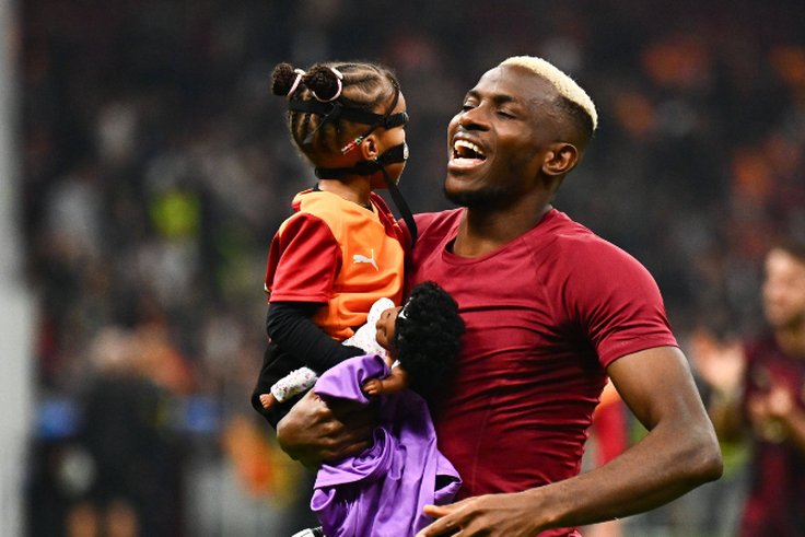 Victor Osimhen celebrating with his daughter after record setting Bodo/Glimt triumph || Image credit: Imago