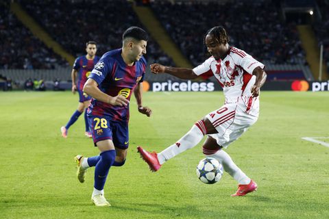Roony Bardghji beats Onyemaechi with a 'snake bite' to assist Barcelona's fifth goal of the night. (Photo Credit: Imago)