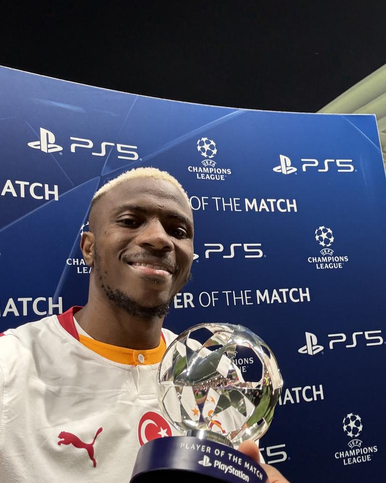 Victor Osimhen with the player of the match award from UEFA.