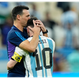 Lionel Messi and Lionel Scaloni share a hug after winning the 2022 World Cup in Qatar