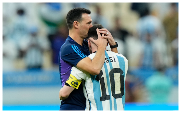Lionel Messi and Lionel Scaloni share a hug after winning the 2022 World Cup in Qatar