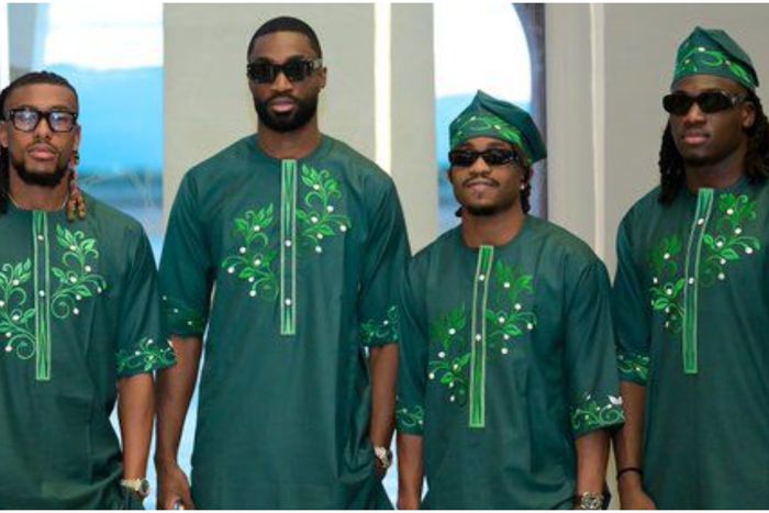 Super Eagles wearing custom-made green native attire. || X