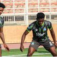 Super Eagles' Brown Ideye and Enyimba training for the game.