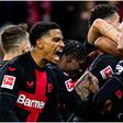 Bayer Leverkusen stars celebrate a history night.