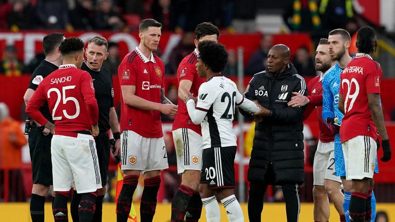 Fulham's Willian protests during FA Cup match against Manchester United.