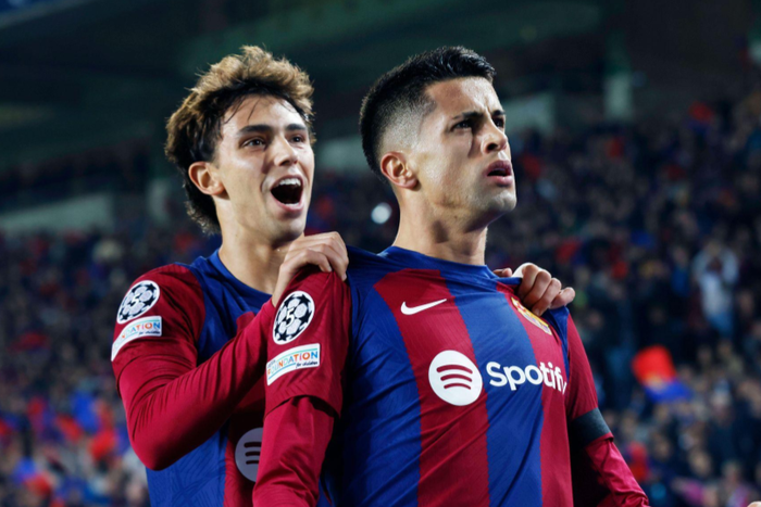 Joao Felix and Joao Cancelo celebrating a goal for Barcelona || Image credit: Imago