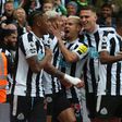 Newcastle United players celebrate a goal vs Tottenham Hotspur.