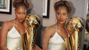 Tems Poses with the NBA Larry O’Brien Championship Trophy