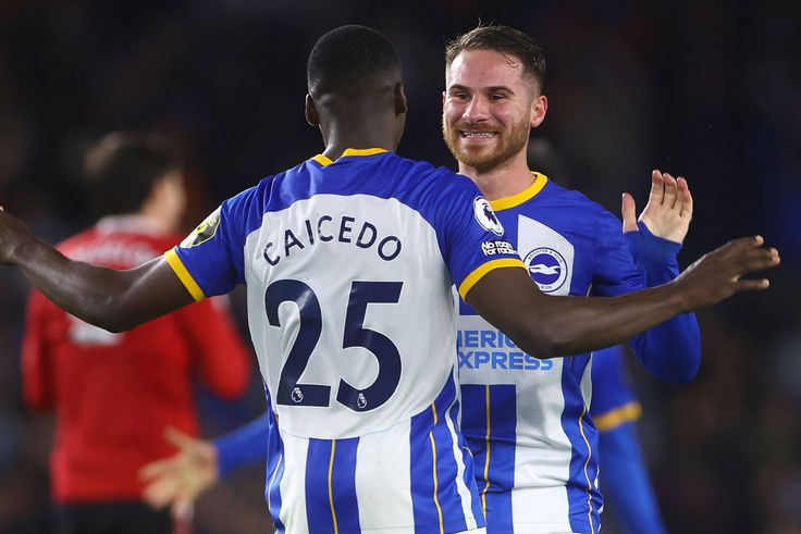 Brighton players celebrate together