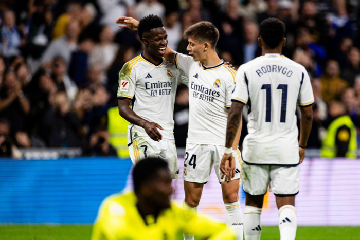 Arda Guler of Real Madrid (C) celebrates his goal with teammates Vinicius Junior (L) and Rodrygo Goes (R) during the La Liga AE match between Real Madrid and Deportivo Alaves || Image credit: Imago