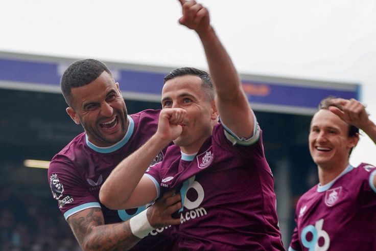 Burnley clinch first Premier League win on return