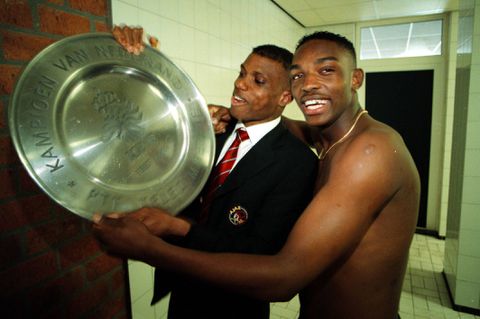 Sunday Oliseh celebrating the Eredivisie with Benni McCarthy || Image credit: Imago