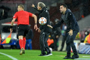 Xavi's Barca held by Benfica in Champions League