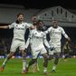 Chukwueze, Iwobi and his teammates celebrate the late winner. (Photo Credit: Imago)