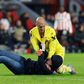 Sevilla keeper Dmitrovic survives fan attack in PSV loss